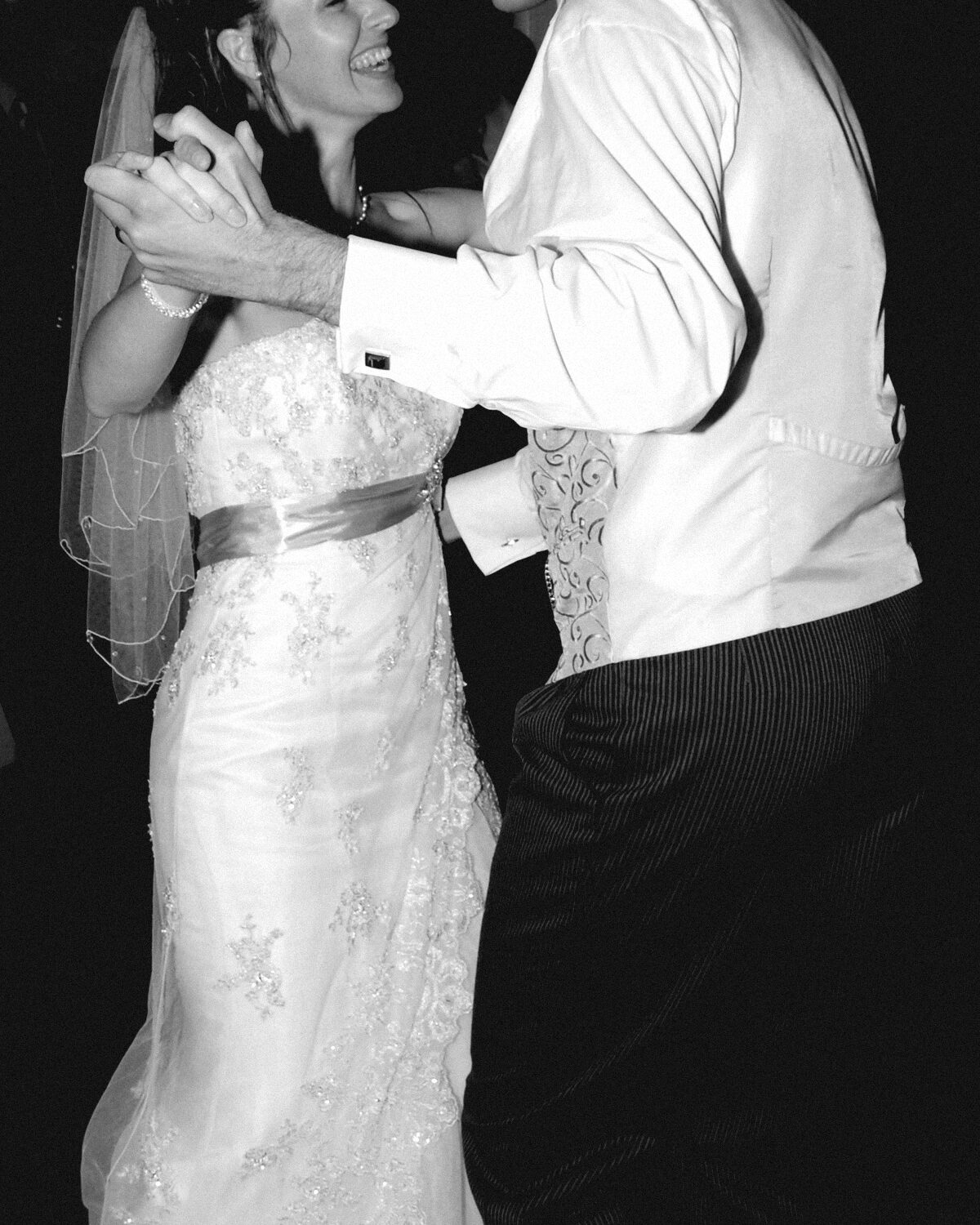 Guests dancing under low light